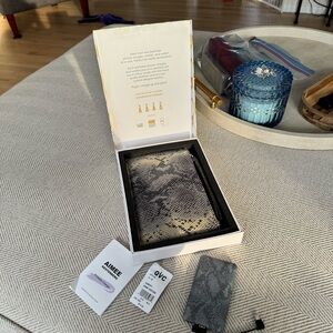 Aimee Kestenberg Black and Cream Snake Print Clutch and Portable Power Bank